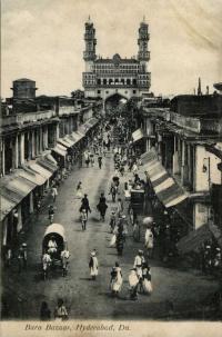Vintage black and white undated postcard of Bara Bazaar, Deccan